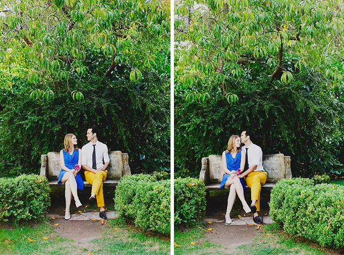 couple sitting on park bench